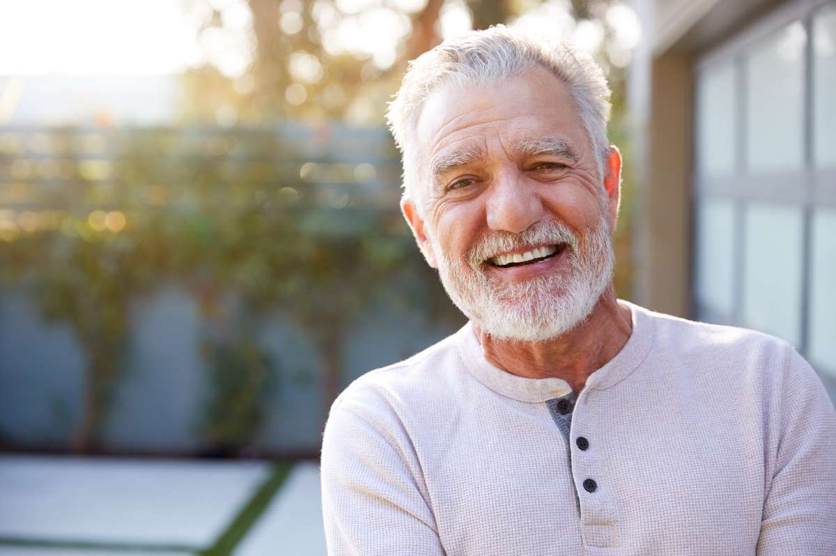 Happy patient confident in new smile after All-on-X at Sonrisa